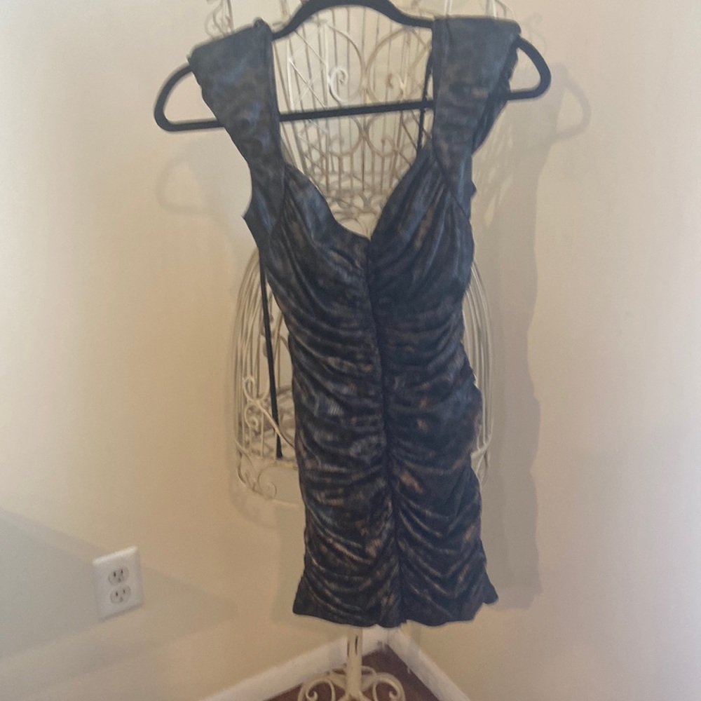 Used once Bebe Animal print dress
